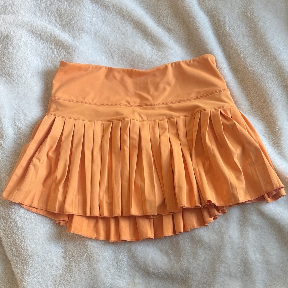 Gold Hinge orange skirt